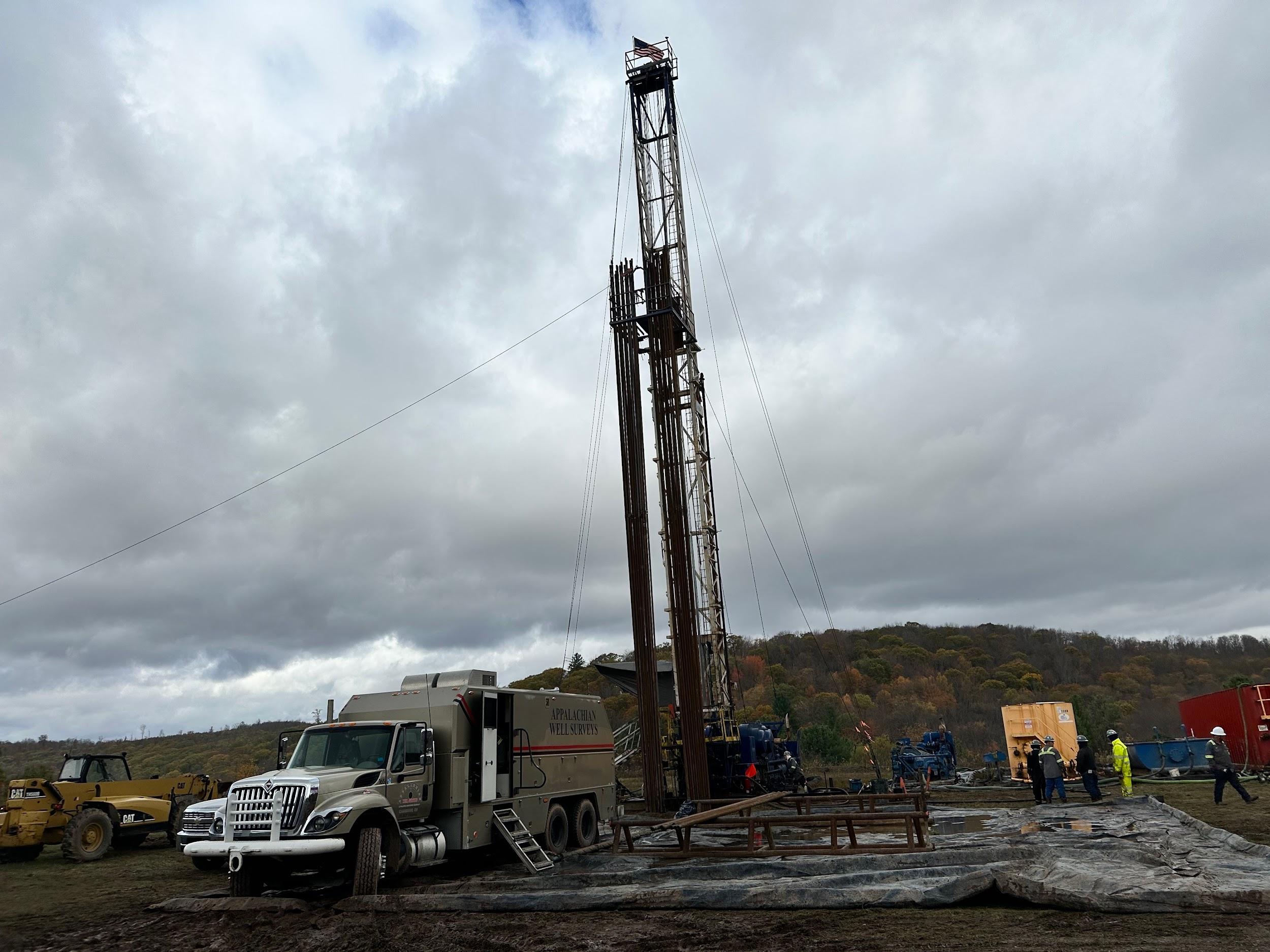 P&G Rig and Wireline Crews are Pictured Above Preparing to Run a Cement Bond Log